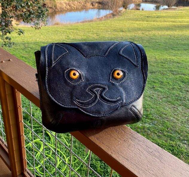 black cat handbag.png