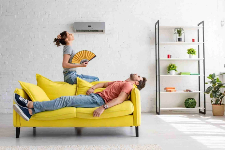 Couple-on-couch-HVAC-too-hot.jpg