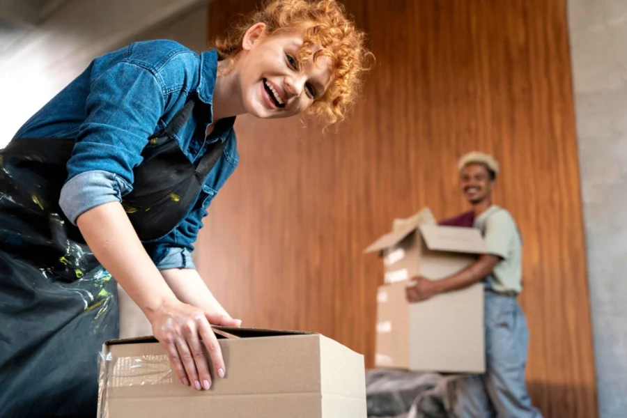 imgi_19_couple-with-cardboard-boxes-their-new-home-1-scaled-1-2048x1366.jpg